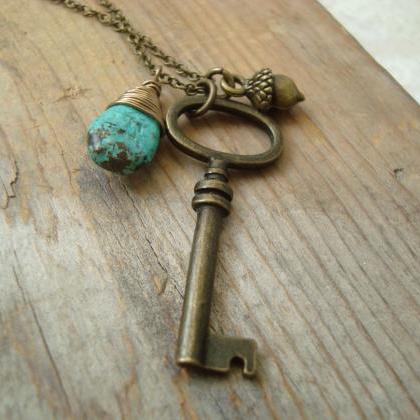 Brass Key Necklace With Turquoise And Acorn Charm..