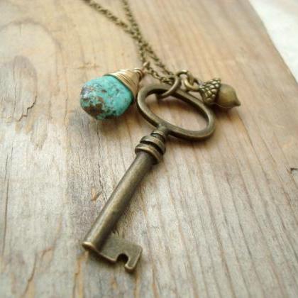 Brass Key Necklace With Turquoise And Acorn Charm..